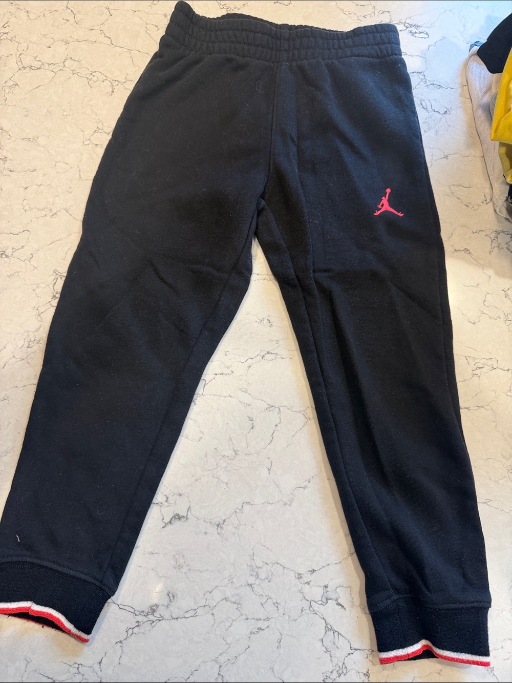 Jordan Black Sweatpants with Pink Jumpman and Red-Trim Cuffs